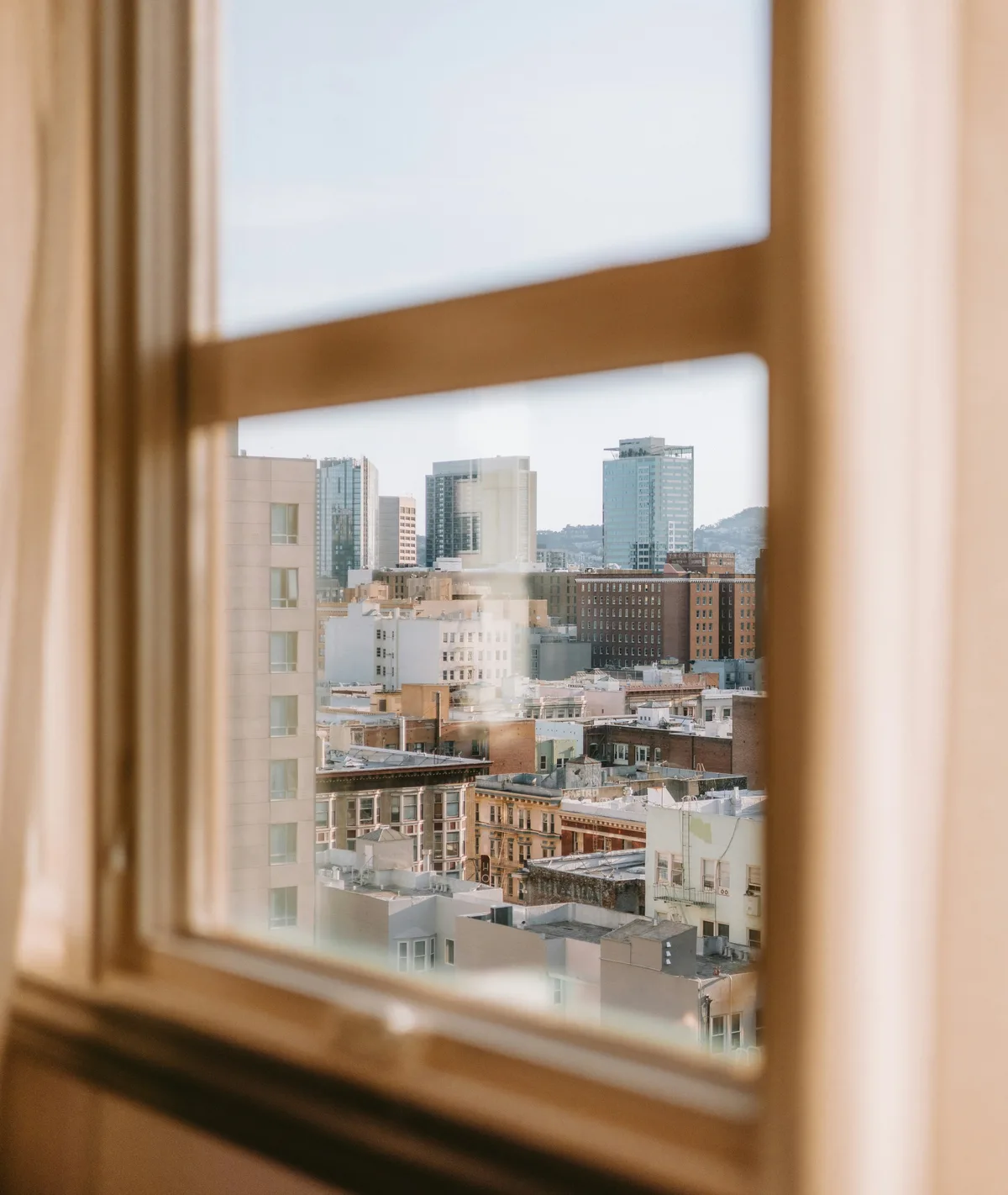 Window with a view over the city skyline